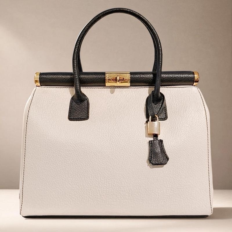 Sac Barbara en cuir de vachette, coloris crème et noir — orme.